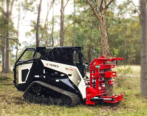 cat skid steer tree cutter|tree cutter attachment skid steer.